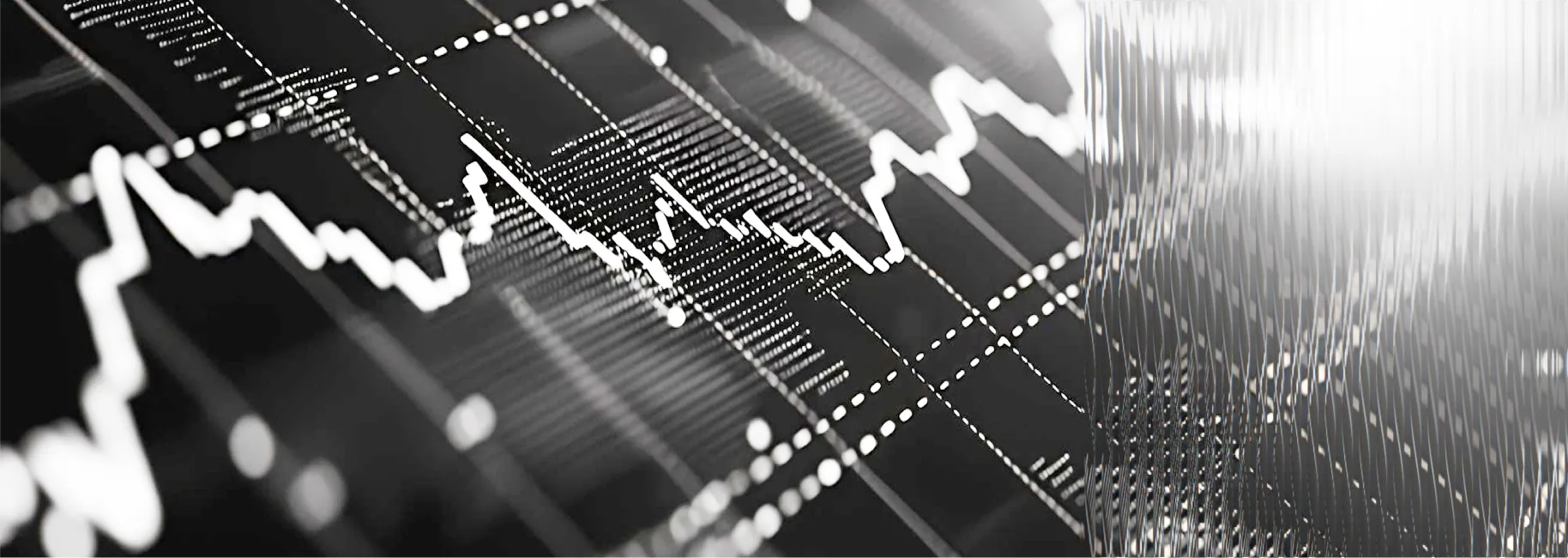 Black and white close-up of a stock market candlestick chart